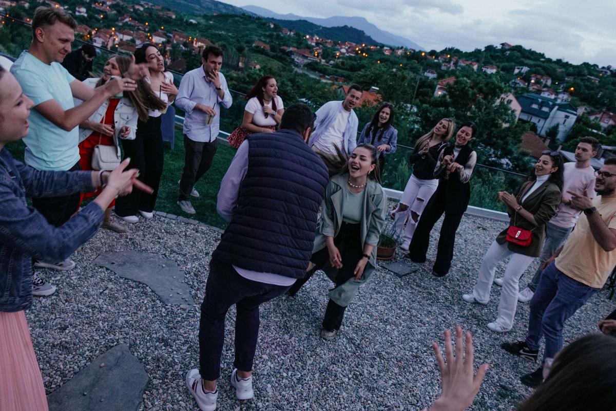 People dancing during a founding anniversary picnic party