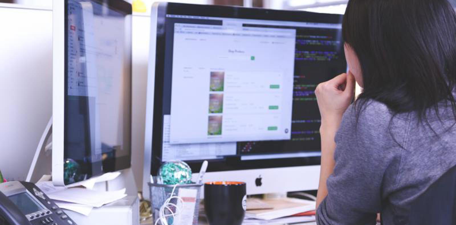 Software engineer working on a computer.